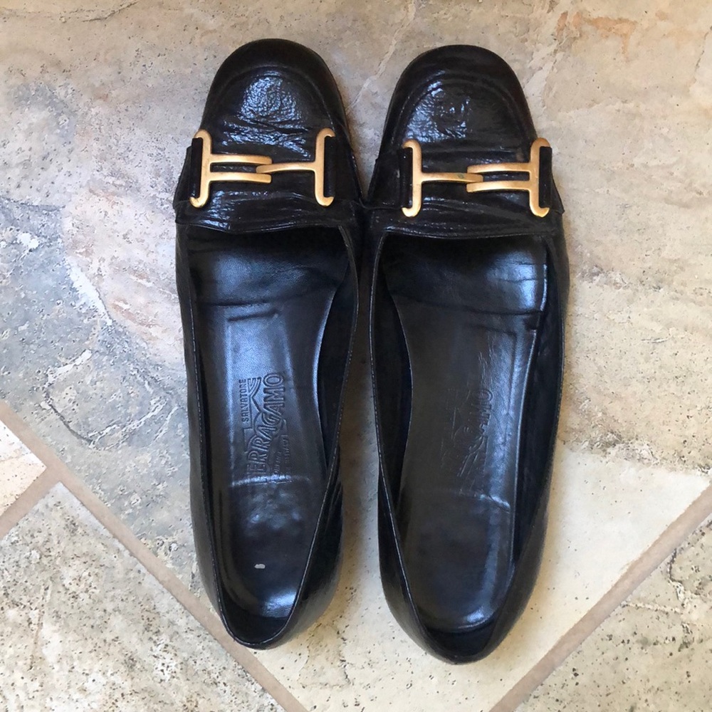 Ferragamo Black flats with gold buckle